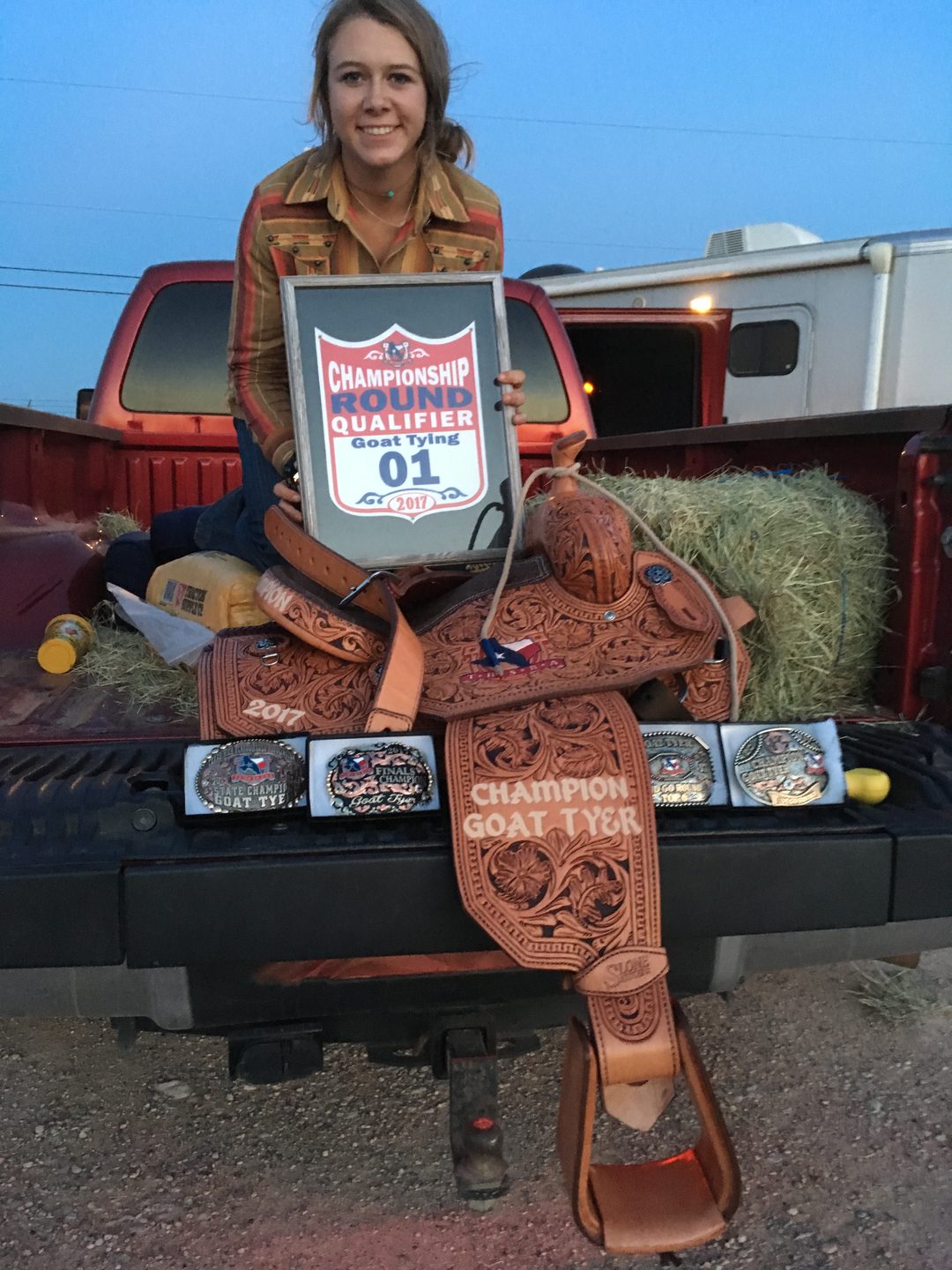 A Next Level champion with her saddle and buckles