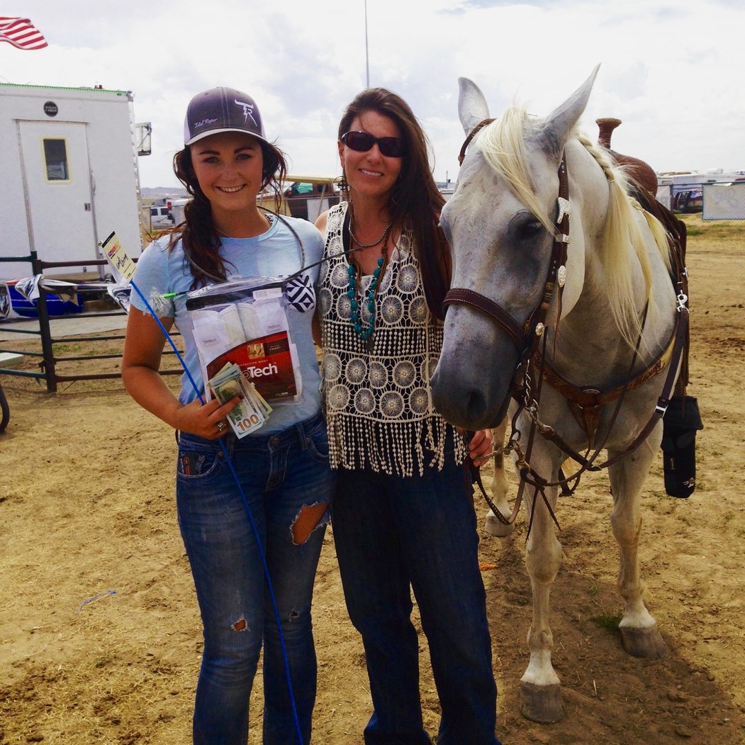 Stacey with a Next Level rider and her horse after a run